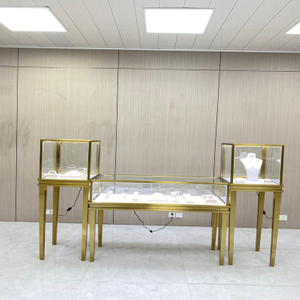 Gabinete de exhibición de joyería de juego de oro de titanio
