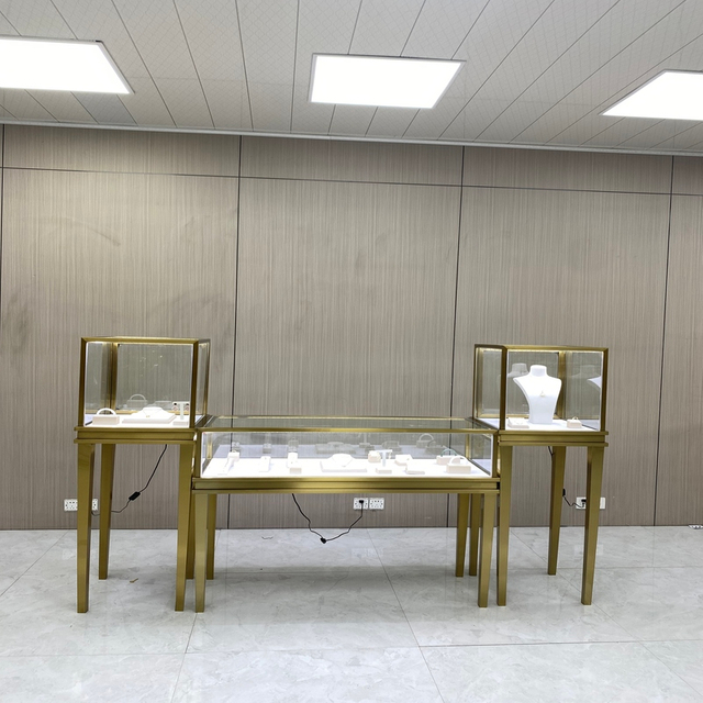 Gabinete de exhibición de joyería de juego de oro de titanio