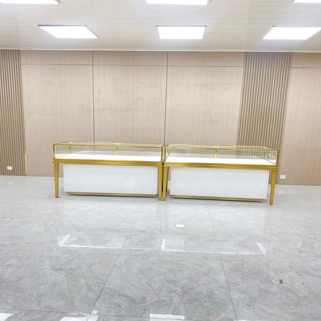 Gabinete de exhibición de joyas de oro de champán