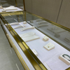 Gabinete de exhibición de joyería de juego de oro de titanio