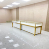 Gabinete de exhibición de joyas de oro de champán