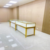 Gabinete de exhibición de joyas de oro de champán